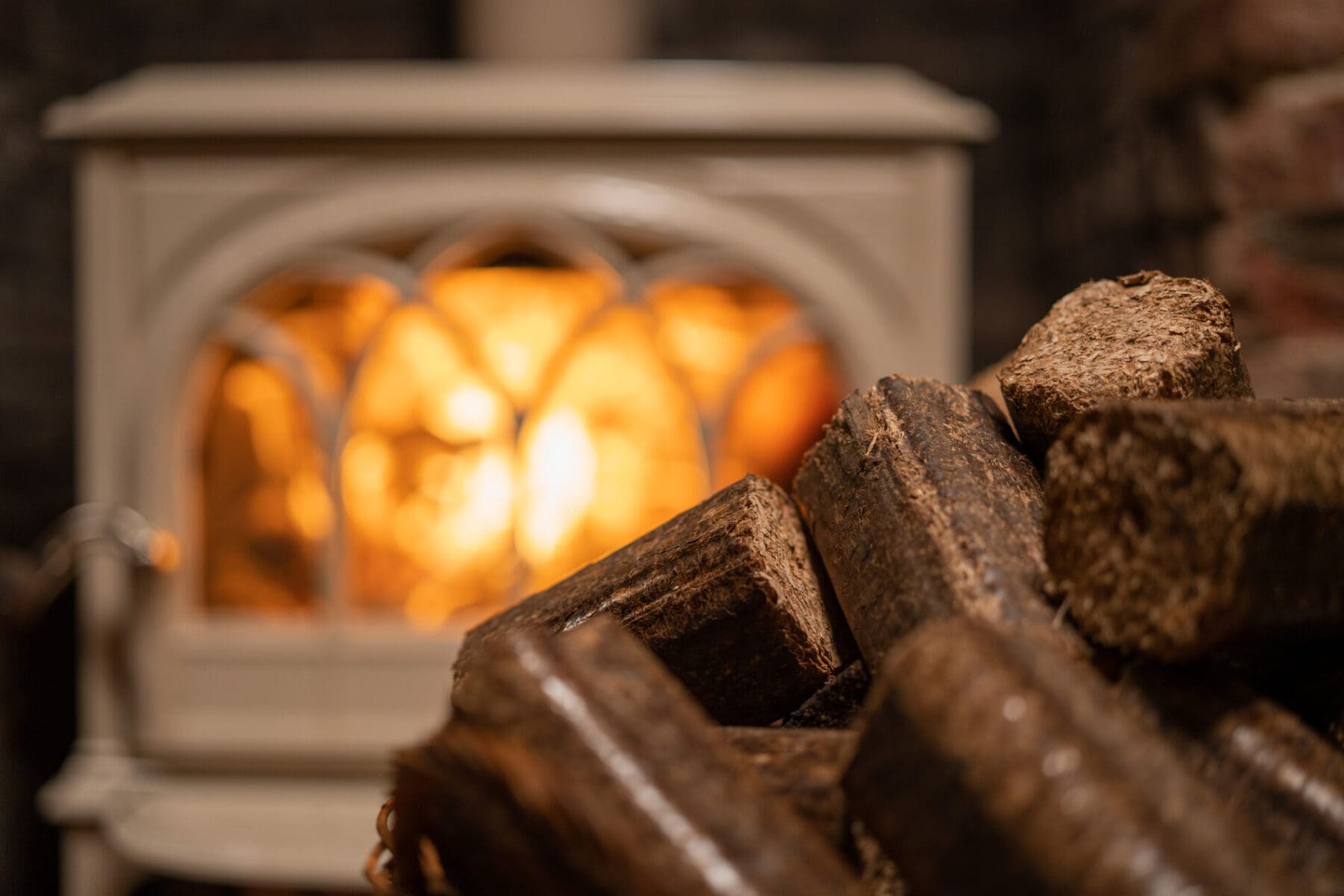 Briquette in front of a stove